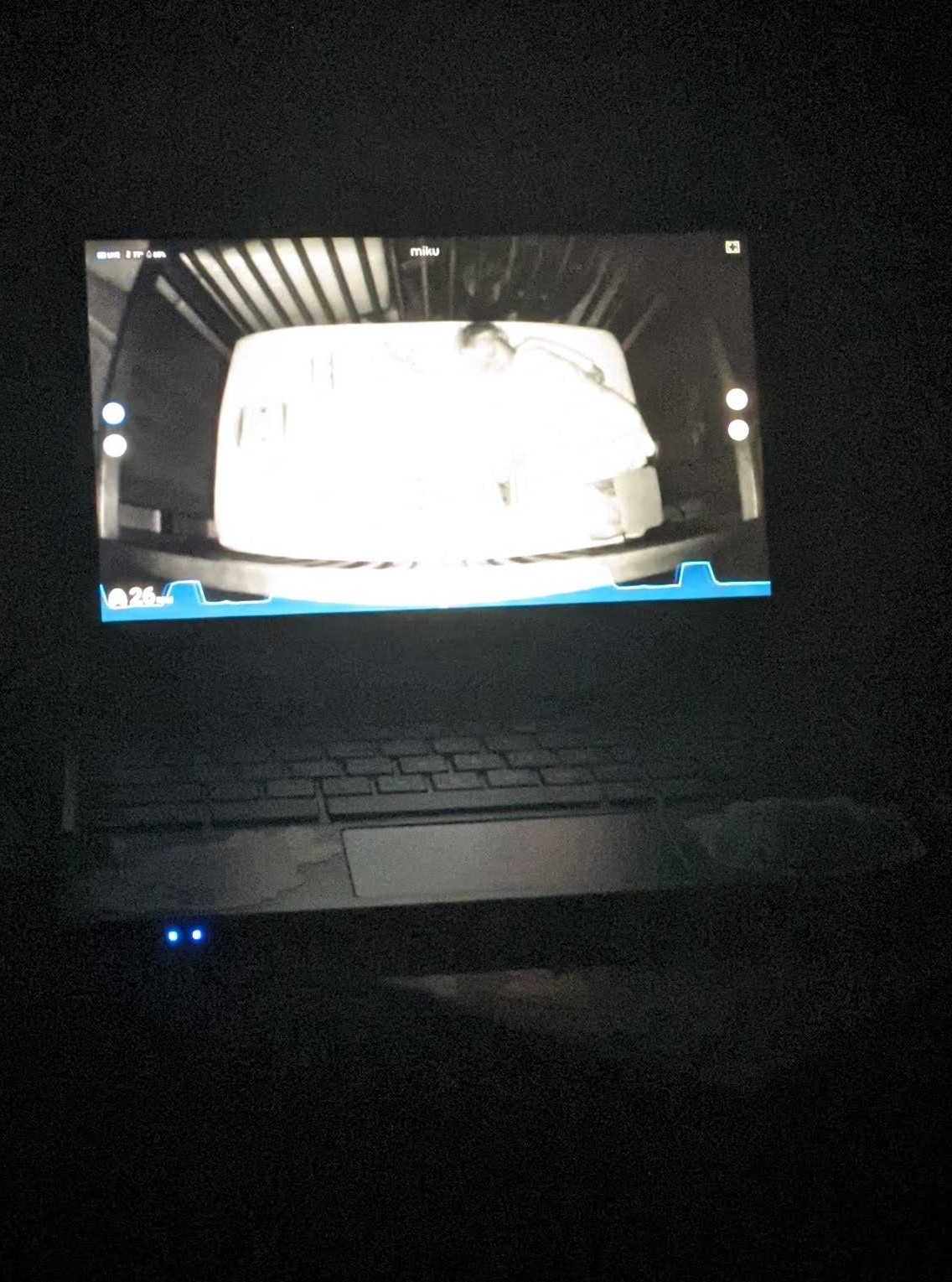Baby monitor laptop setup showing breathing graphs
