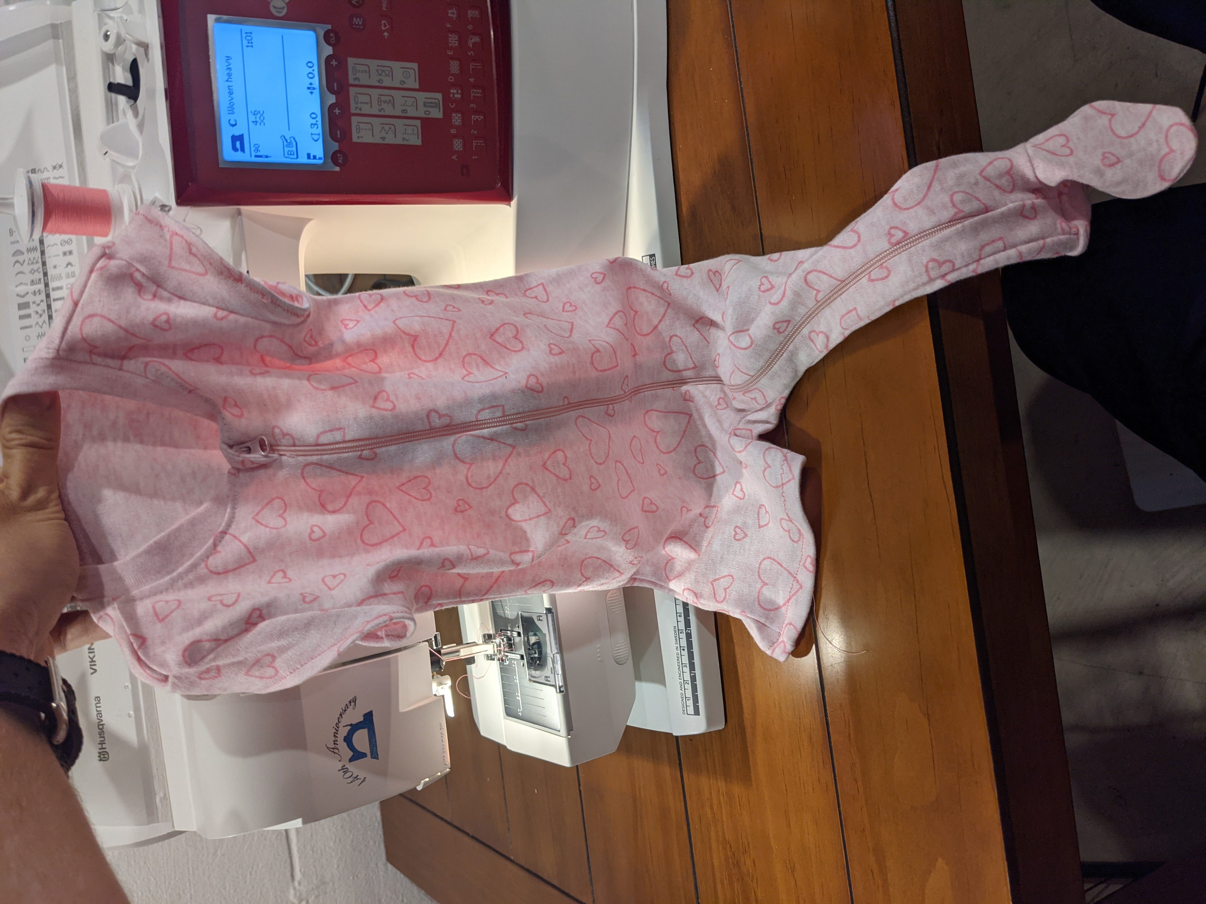 Modified pajamas with one leg cut off for wound vacuum tube management